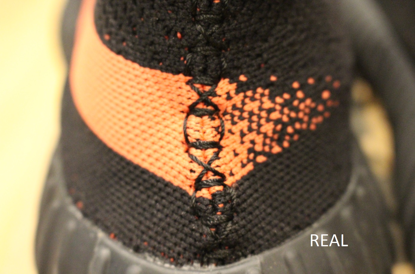 fake yeezys black and orange